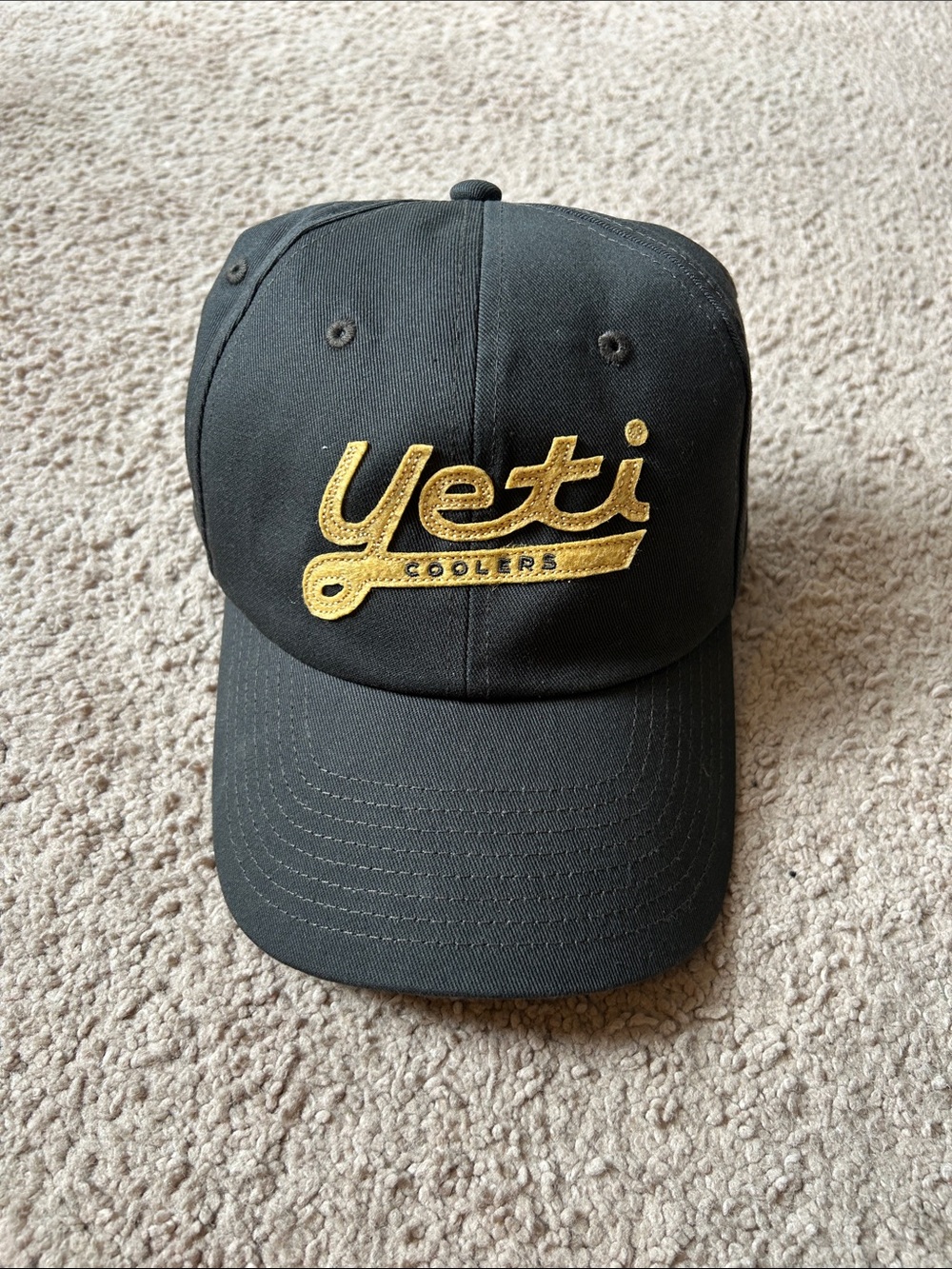 Yeti Charcoal Baseball Cap with Gold Script Logo